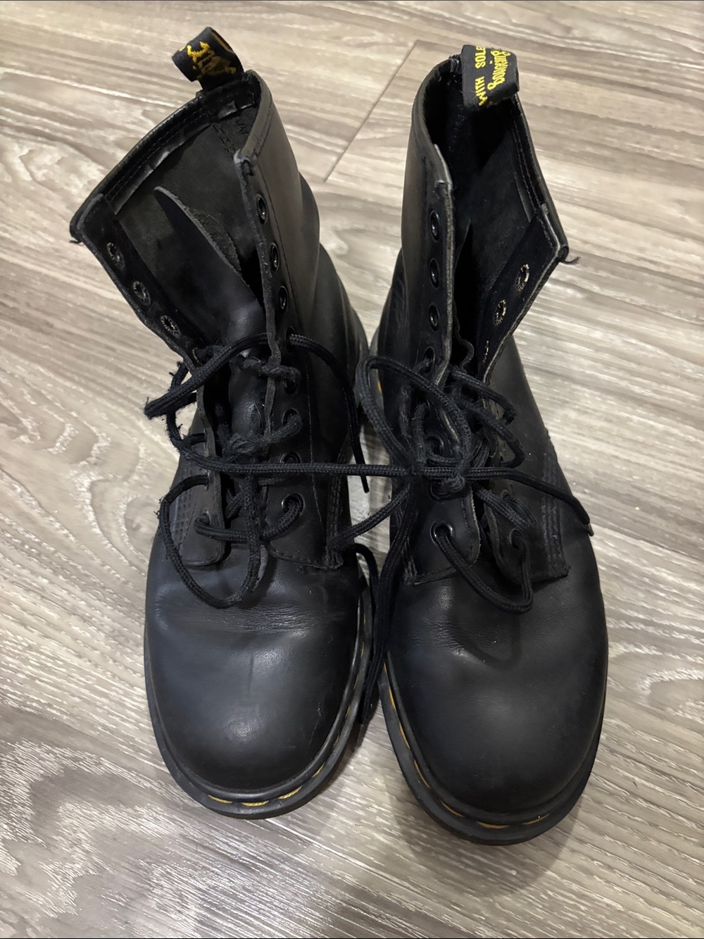 Dr. Martens Black Leather 8-Eye Lace-Up Boots with Yellow Stitching